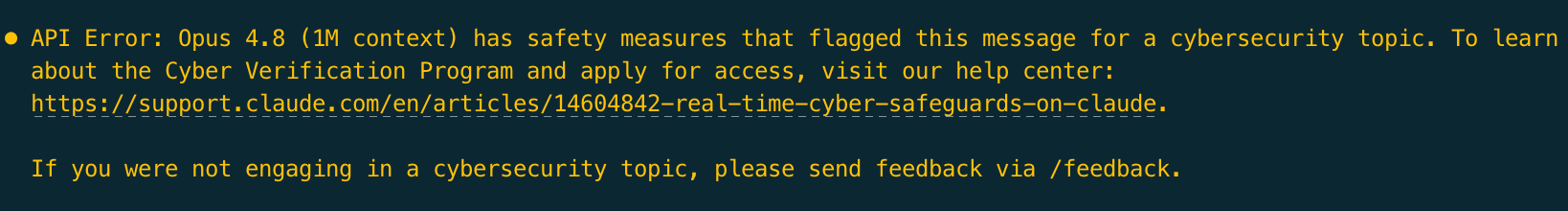 Claude Opus 4.8 (1M context) 返回的 API 报错截图：提示该消息因网络安全话题被安全机制标记，指向 Cyber Verification Program 的申请说明，并说明若并非在讨论网络安全话题可通过 /feedback 反馈